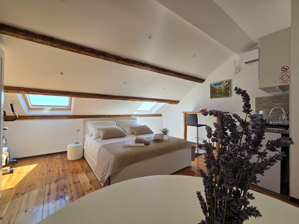 Bed, Living room, Seating area, Bedroom