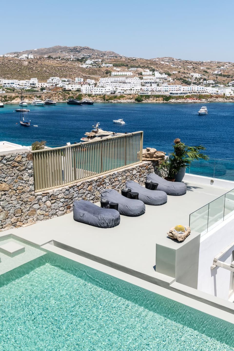 Property building, Nearby landmark, Day, Natural landscape, View (from property/room), Pool view, Sea view, Swimming pool, sunbed