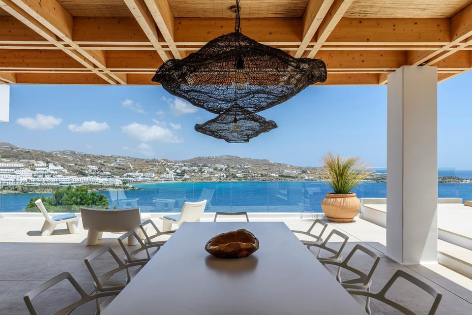 Day, View (from property/room), Living room, Seating area, Dining area, Sea view