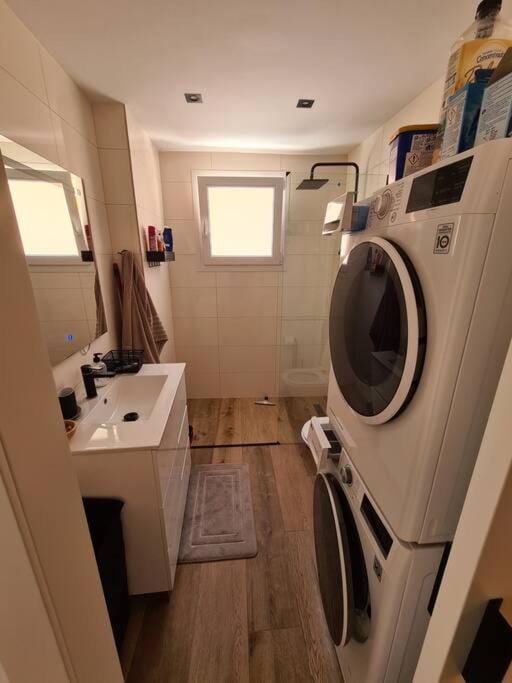 Bathroom, washing machine, dryer