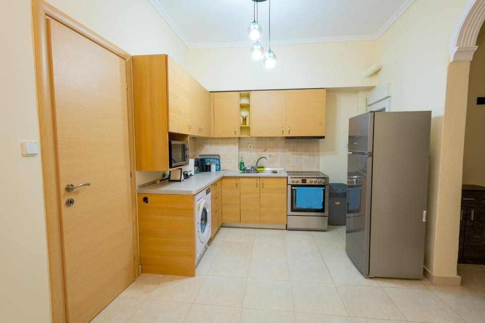 Kitchen or kitchenette, oven, stove, washing machine