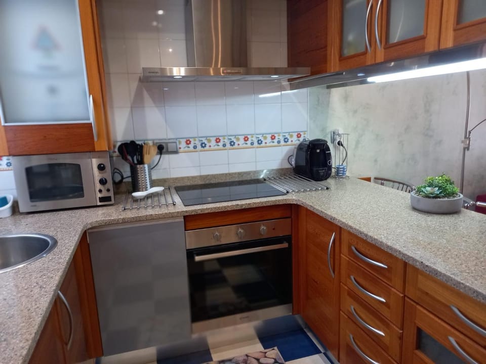 Coffee/tea facilities, dishwasher, flat iron, heating, microwave, oven, stove, toaster, trouser press, washing machine