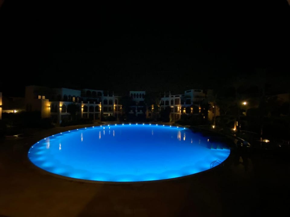 Lovely first floor tow bed rooms overviewing circular pool for families only in Talabay Aqaba Apartment in South District