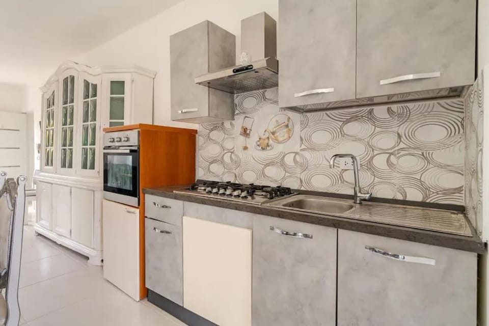 Kitchen or kitchenette, oven, stove