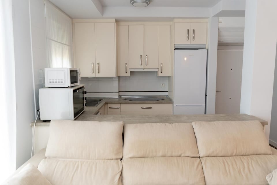 Kitchen or kitchenette, Living room, Seating area, stove
