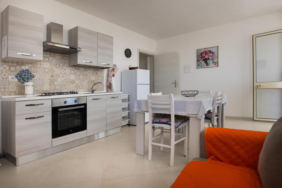 Kitchen or kitchenette, Living room, Seating area, Dining area, oven, stove, kitchen