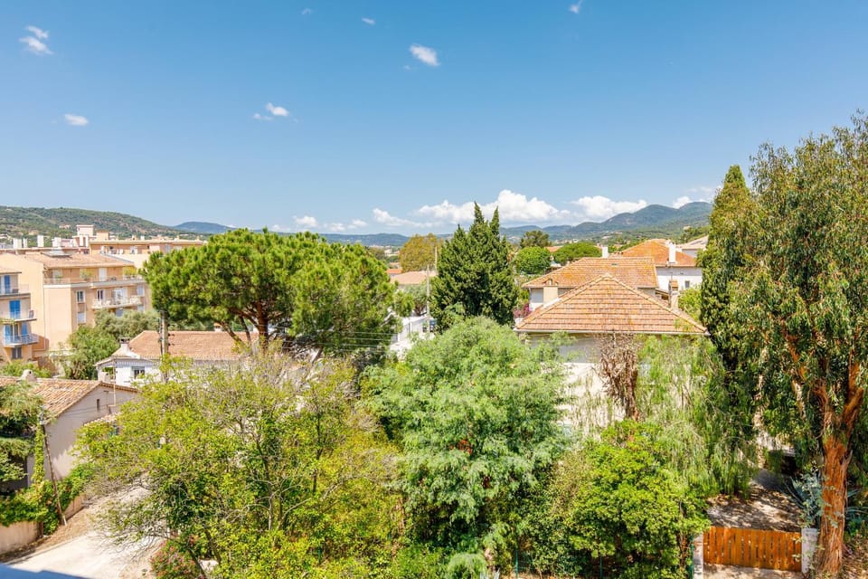 Property building, Nearby landmark, Day, Natural landscape, City view, Mountain view