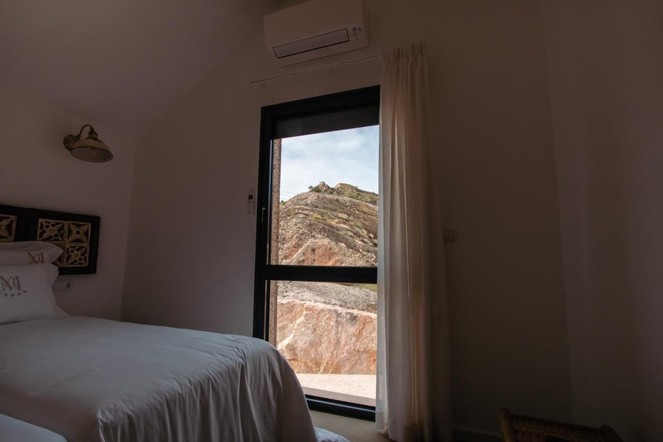 Bed, Natural landscape, View (from property/room), Bedroom, Mountain view, air conditioner