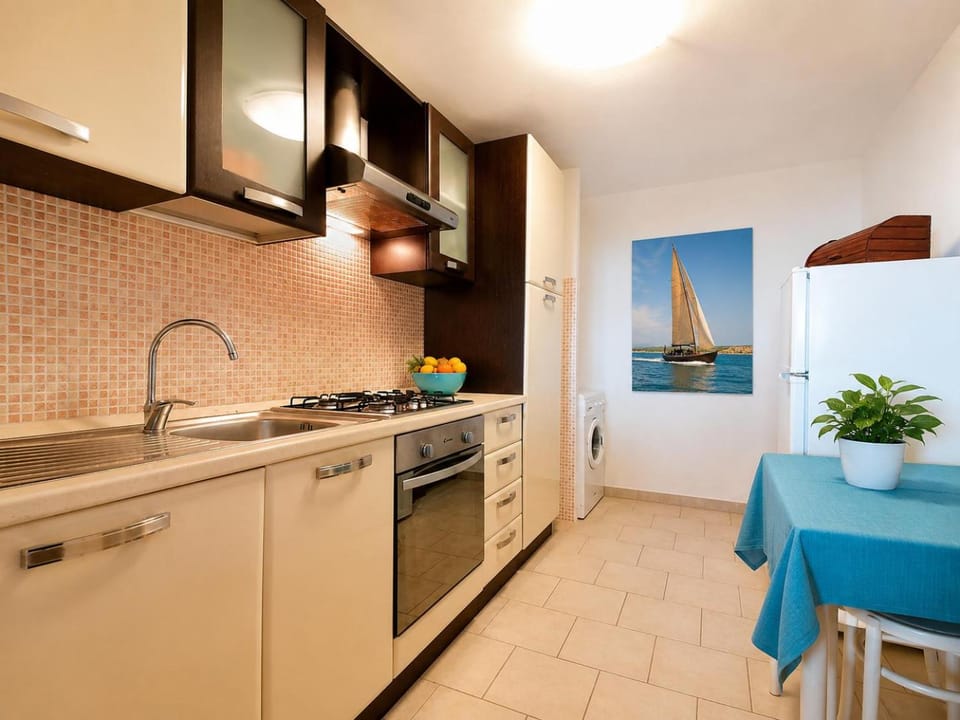 Kitchen or kitchenette, oven