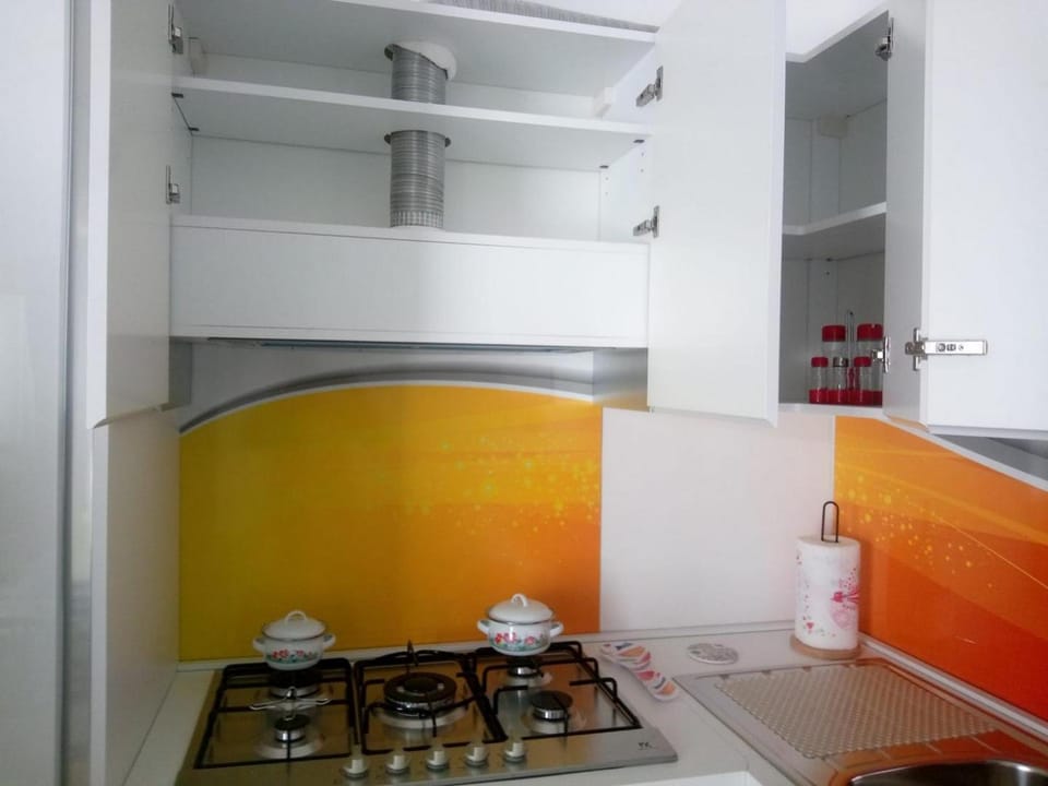 Kitchen or kitchenette, stove