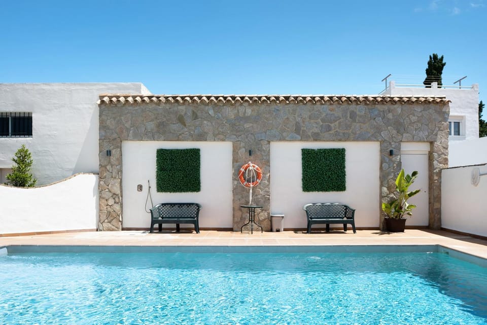 Property building, Living room, Swimming pool