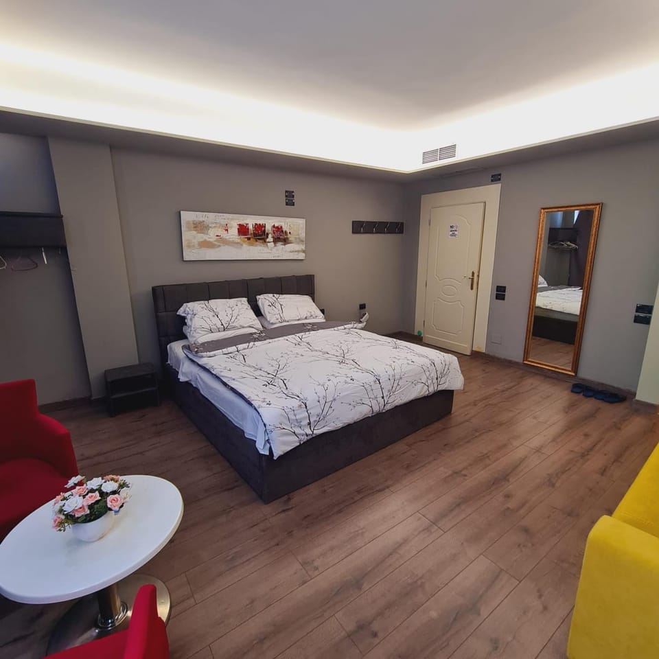 Bed, Seating area, Bedroom