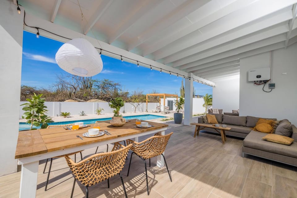 Patio, View (from property/room), Seating area, Dining area, Swimming pool