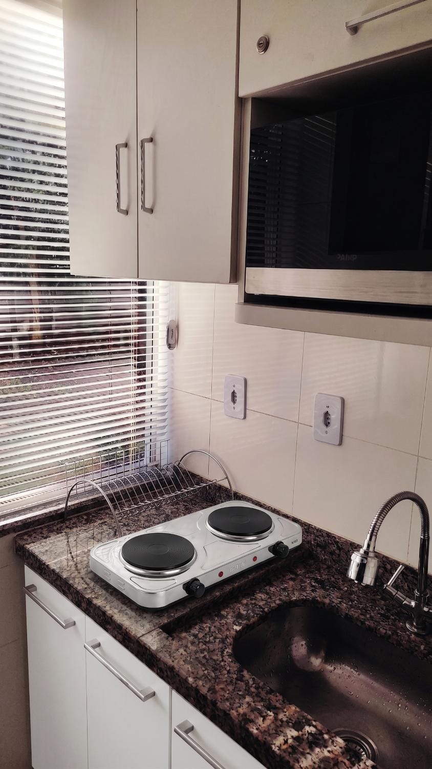 Kitchen or kitchenette, stove, kitchen