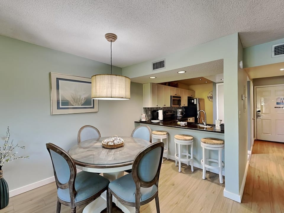 Kitchen or kitchenette, Seating area, Dining area, furniture, air conditioner