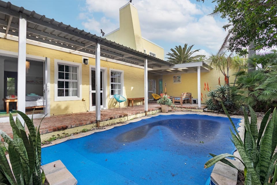 Sunset Yellow Cottage Villa in Cape Town