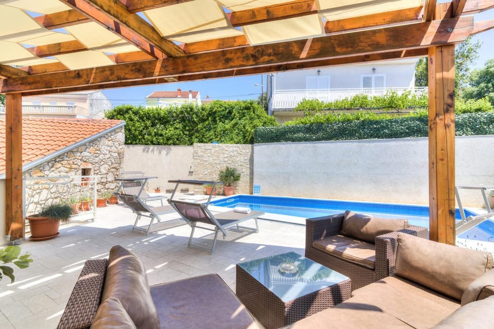Property building, Seating area, Swimming pool