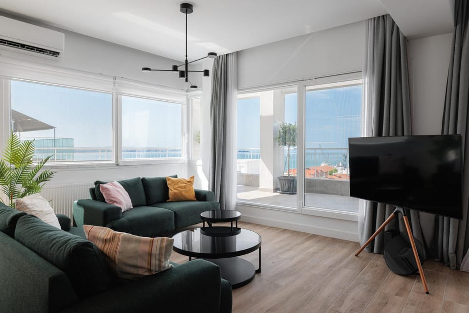 View (from property/room), Living room, Seating area, Sea view