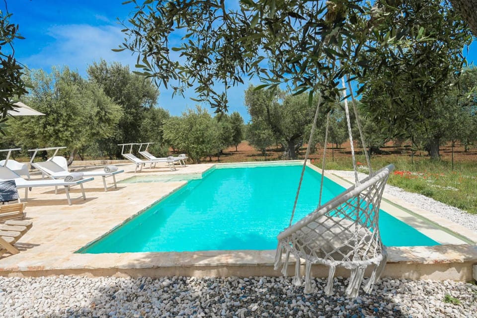 Property building, Living room, Swimming pool