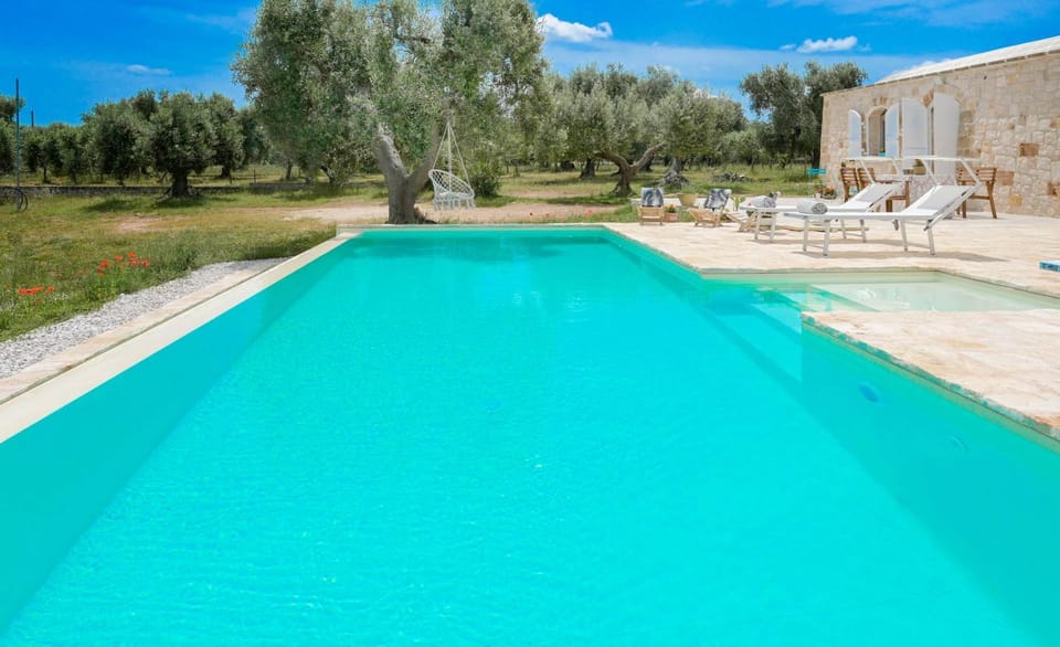Property building, Living room, Swimming pool