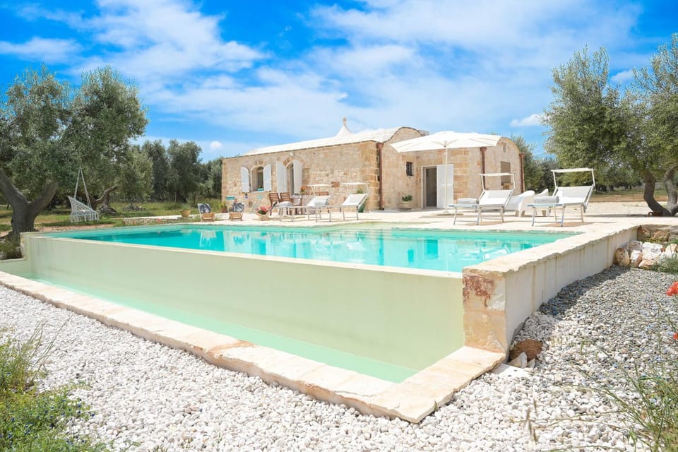 Property building, Living room, Swimming pool