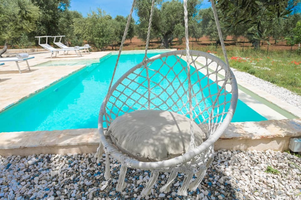 Property building, Living room, Swimming pool