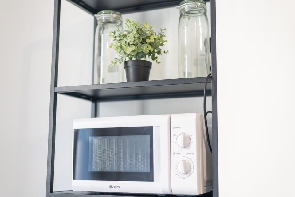 Kitchen or kitchenette, microwave, oven