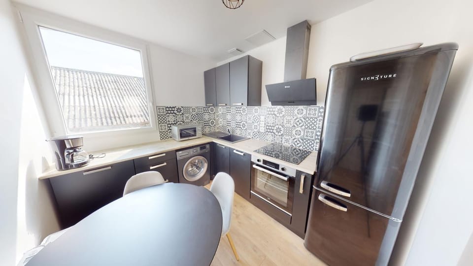 Kitchen or kitchenette, dishwasher, oven, stove