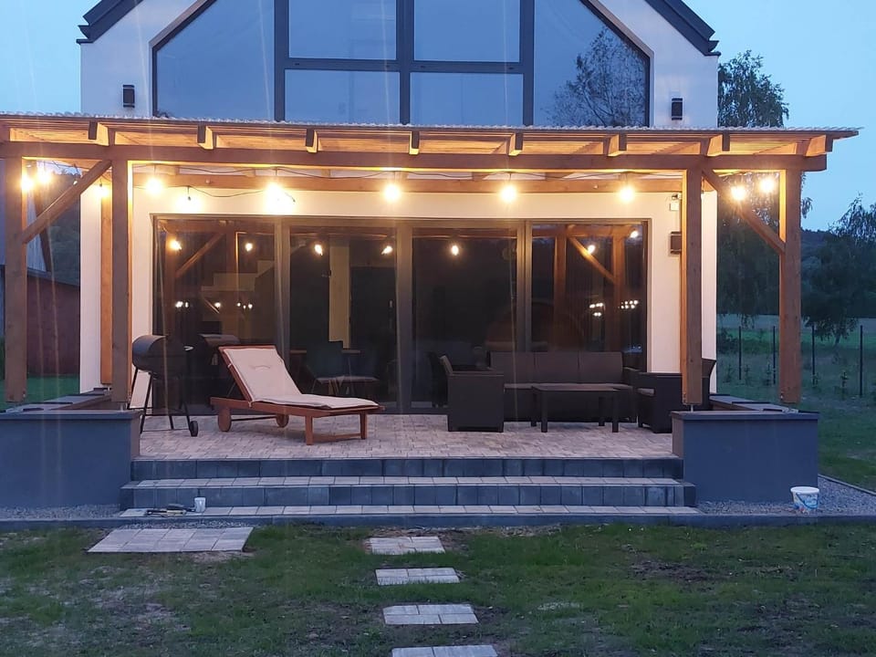 Property building, Patio, Night, Garden, Balcony/Terrace, Seating area, sunbed