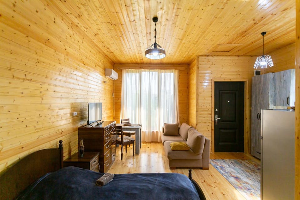 TV and multimedia, Kitchen or kitchenette, Living room, Seating area, Dining area