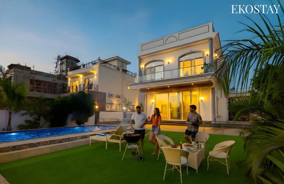 Property building, Night, People, Seating area, Guests, Pool view, Swimming pool, group of guests