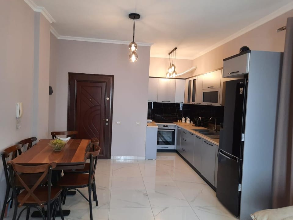 Kitchen or kitchenette, Living room, Seating area, dishwasher, minibar