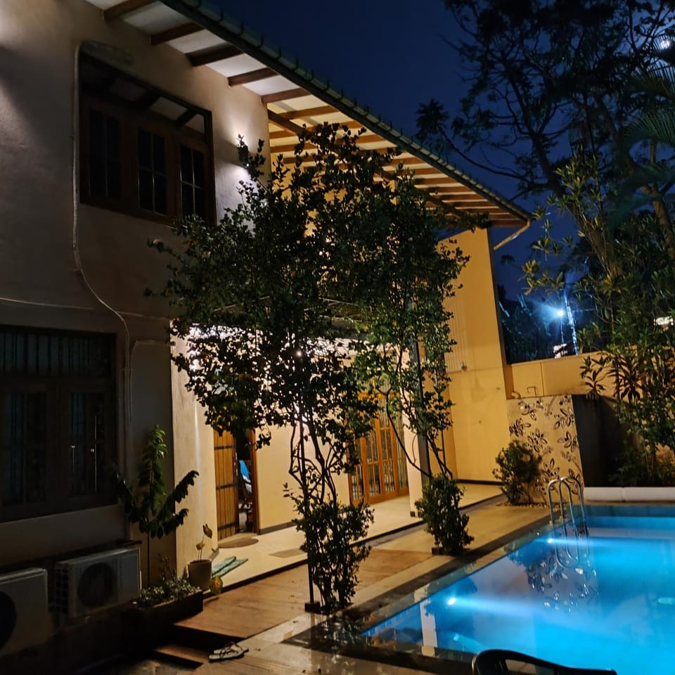 Property building, Patio, Night, Swimming pool