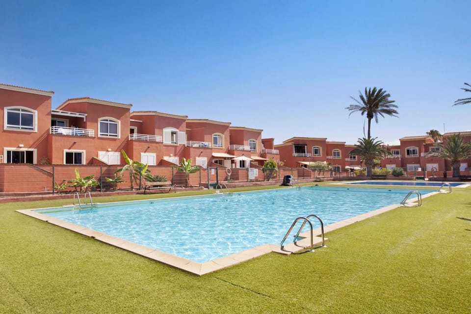 Property building, Living room, Swimming pool