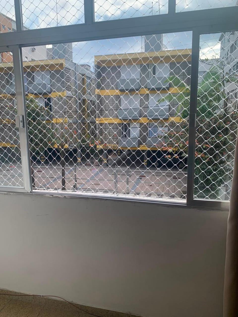 Apartamento Praia das Astúrias, 2 minutos de caminhada para praia, piscina, garagem demarcada, cama Queen Apartment in State of São Paulo