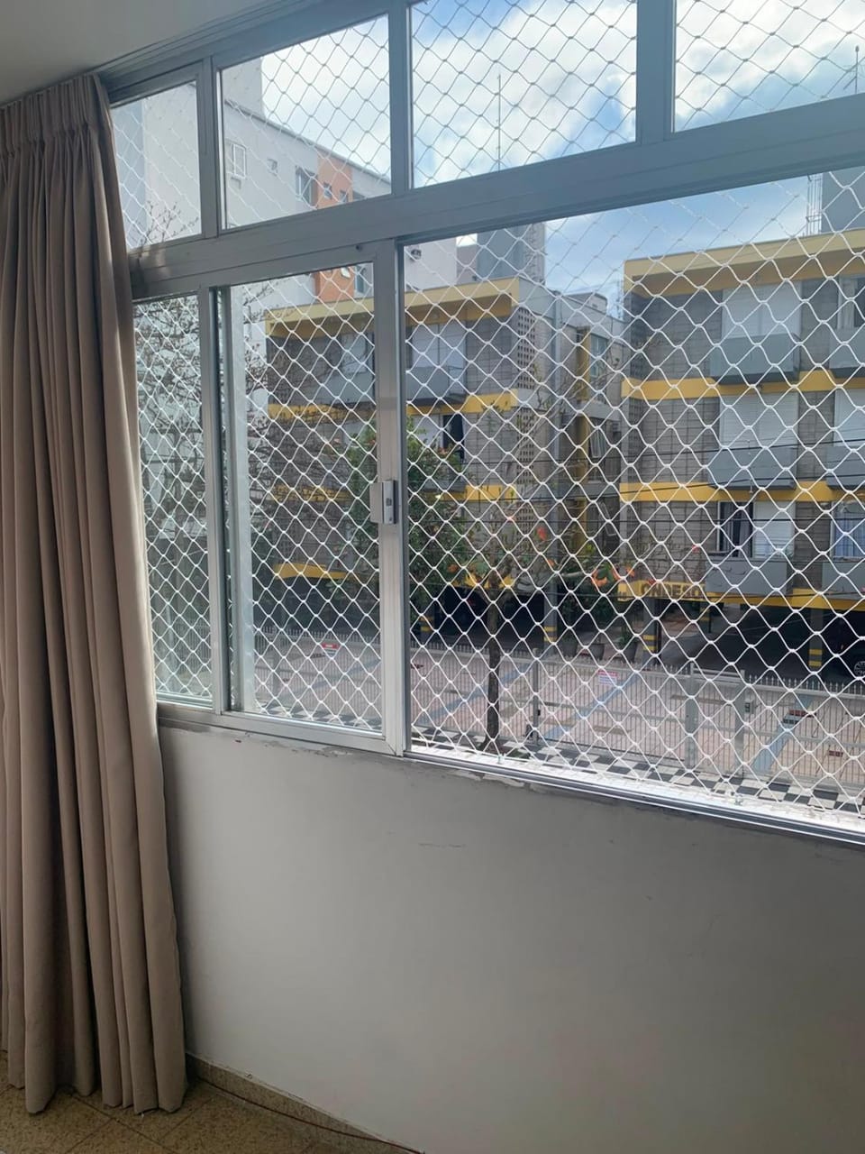 Apartamento Praia das Astúrias, 2 minutos de caminhada para praia, piscina, garagem demarcada, cama Queen Apartment in State of São Paulo