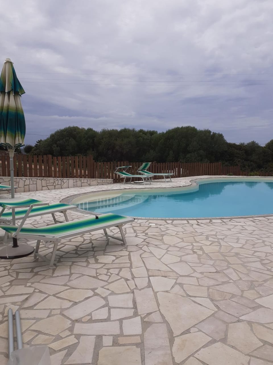 Swimming pool, sunbed