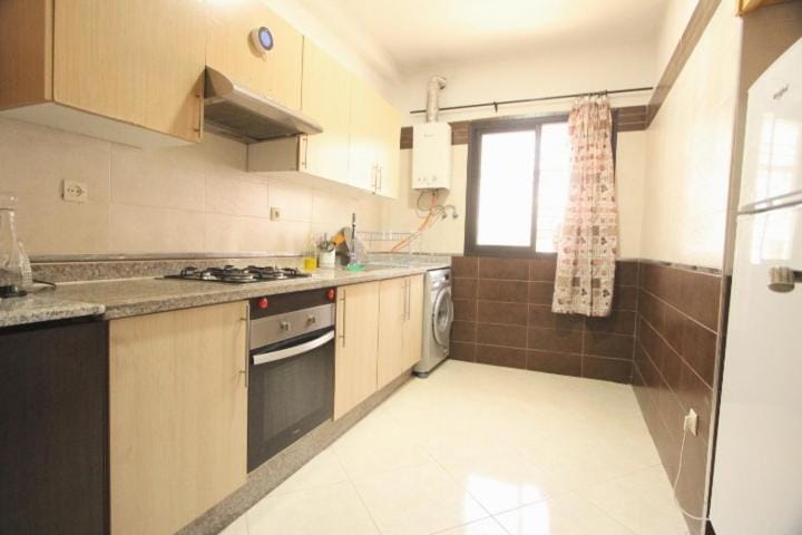Kitchen or kitchenette, oven, stove