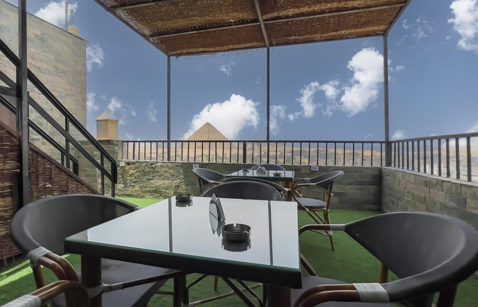 Patio, Restaurant/places to eat, Day, Natural landscape, View (from property/room), Balcony/Terrace, Seating area, Dining area, Landmark view, Mountain view, Breakfast