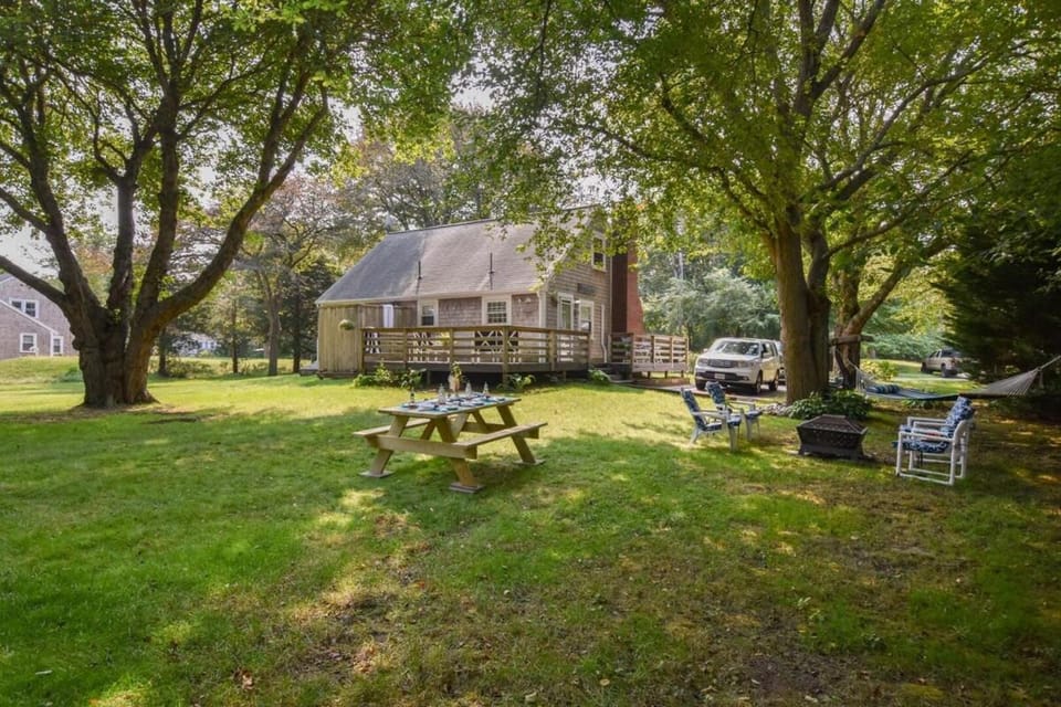 Outdoor Oasis w Fire Pit Hammock 1 Mi to Beach House in Brewster