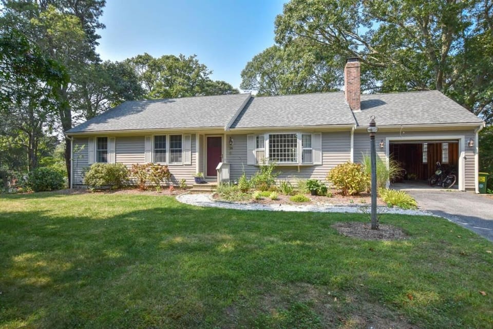 Pond Front Home with Private Dock House in Brewster