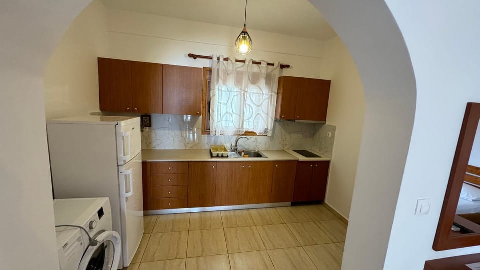Kitchen or kitchenette, washing machine