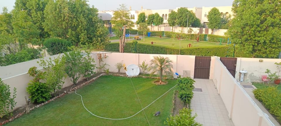 Haven Lodge Lahore by Haven Holiday Homes - 4BR Vacation Home with Lawn & Park Access House in Lahore