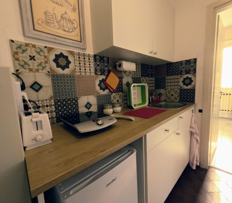 Kitchen or kitchenette, oven, stove, toaster