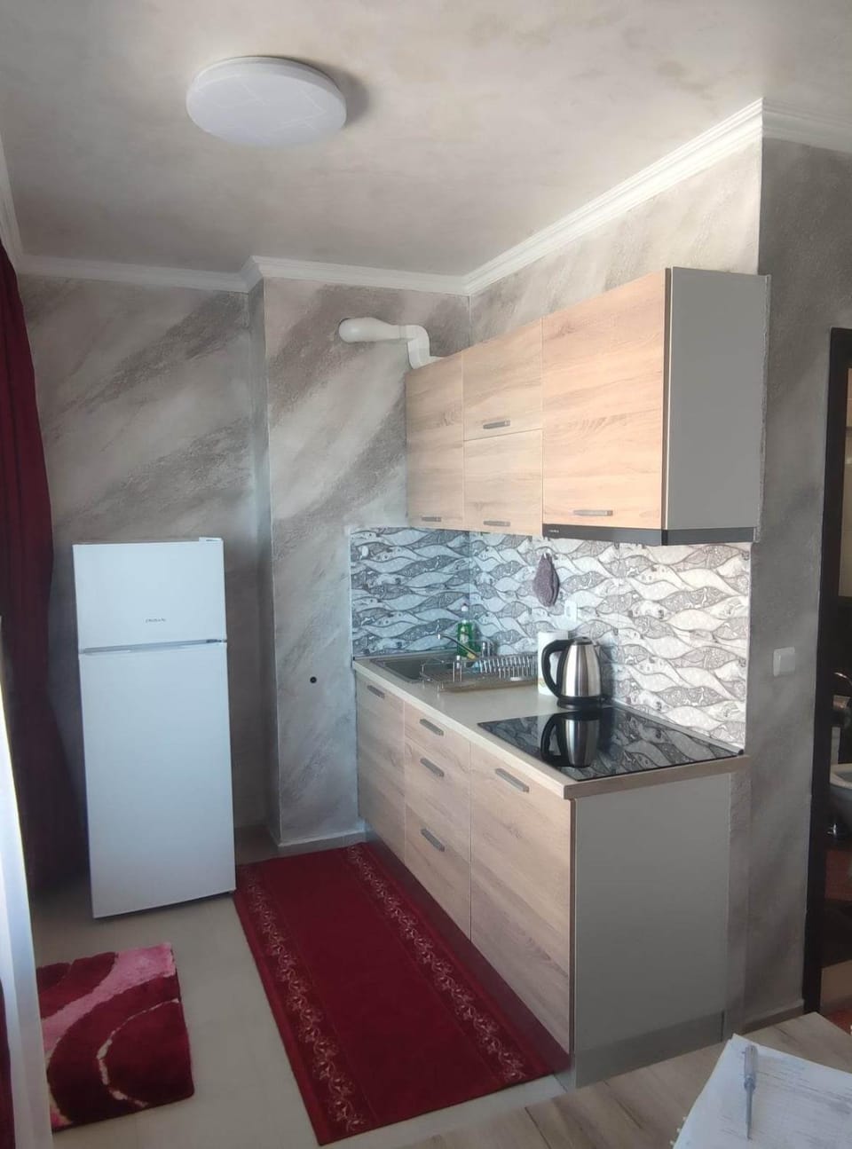 Kitchen or kitchenette, stove