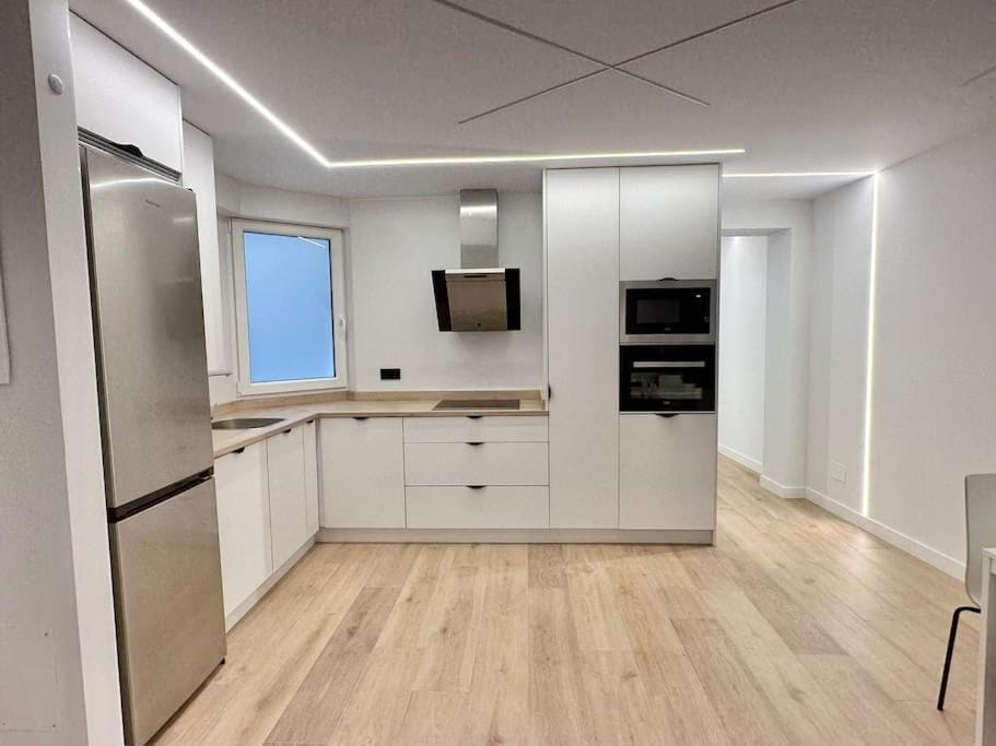 Kitchen or kitchenette, oven, stove