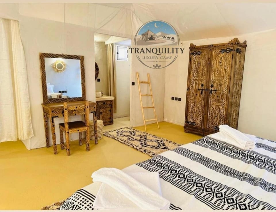 Bed, Photo of the whole room, Bedroom, Text overlay, Certificate/Award, towels