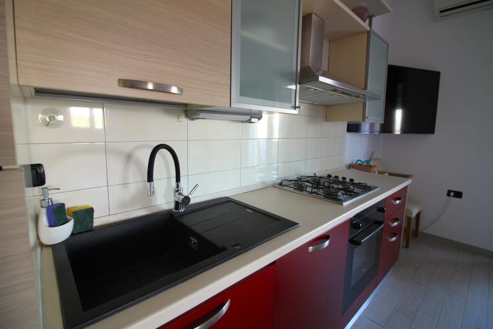Kitchen or kitchenette, stove