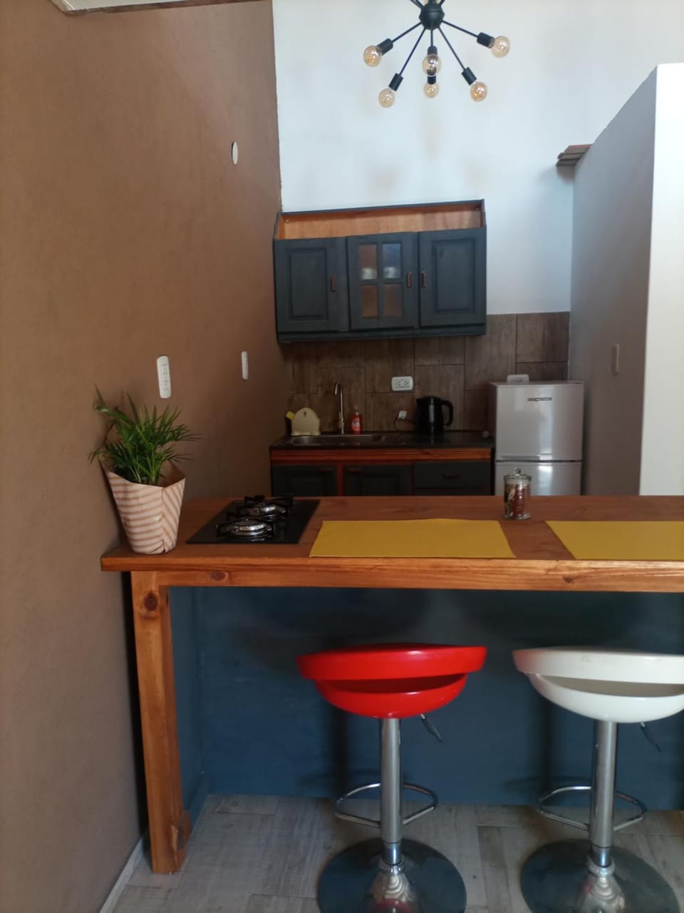 Kitchen or kitchenette, stove