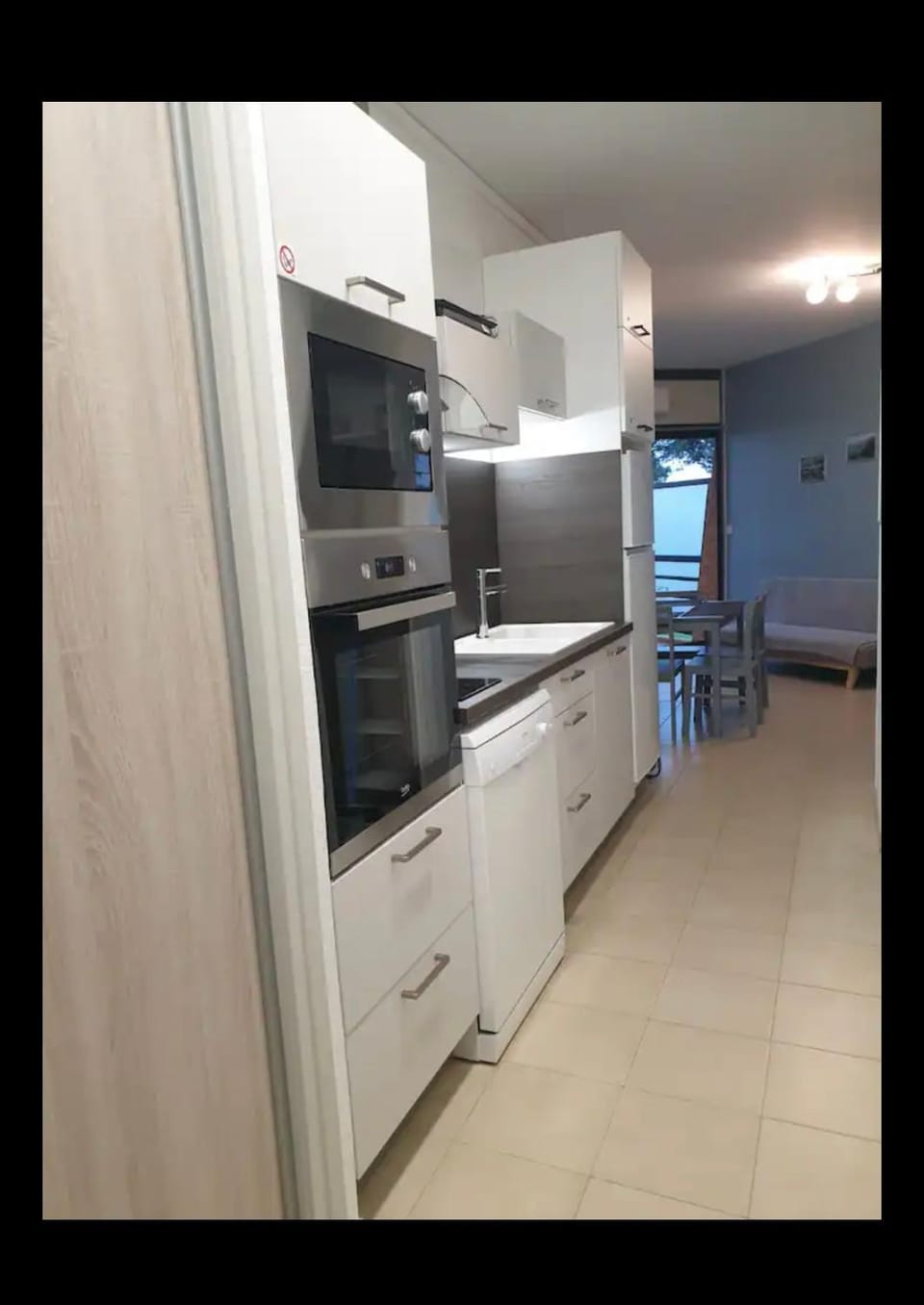 Kitchen or kitchenette, oven, stove